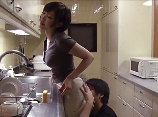 Hot Japanese housewife attacked by her insatiable lover in a kitchen