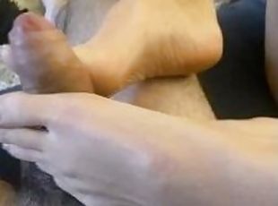 Cute feet footjob on the couch while waiting for delivery