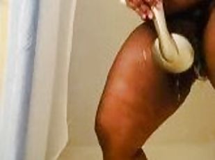 Ebony MILF showers in long sleeve white shirt and then masturbates