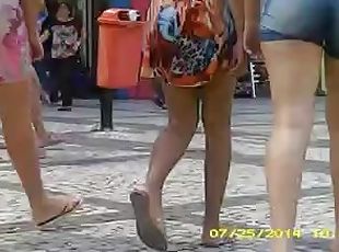 Girl with beautiful legs gets caught on a hidden cam in the street