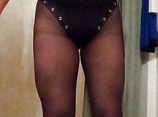 Black leather one piece and pantyhose