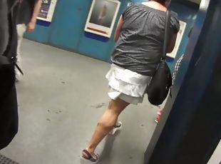 Massive muscular calves on woman in street