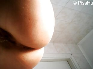 Pretty pissing girl in a hidden cam voyeur video