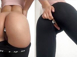 fitness girl puts on a hot show in ripped leggings with her amazing ass