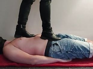 Trampling on my slave with boots and barefoot